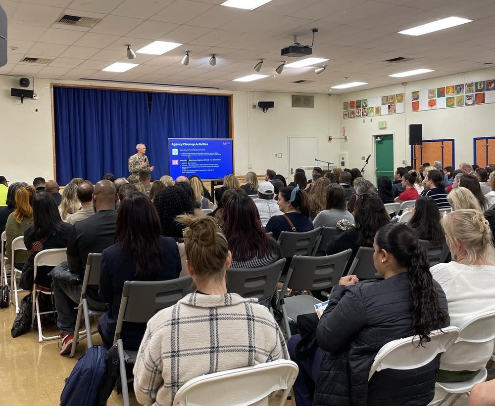 Col. Brian D. Sawser visits with Palisades Elementary School families during a townhall meeting