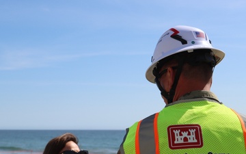 Lt. Col. Nathaniel A. Weander visits with property owner along Pacific Coast Highway