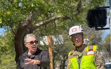 Col. Brian D. Sawser films segment for The Adam Carolla Show Podcast on debris removal and right-of-entry deadline