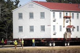 Contractors take advantage of good weather; successfully move third of five World War II-era barracks at Fort McCoy