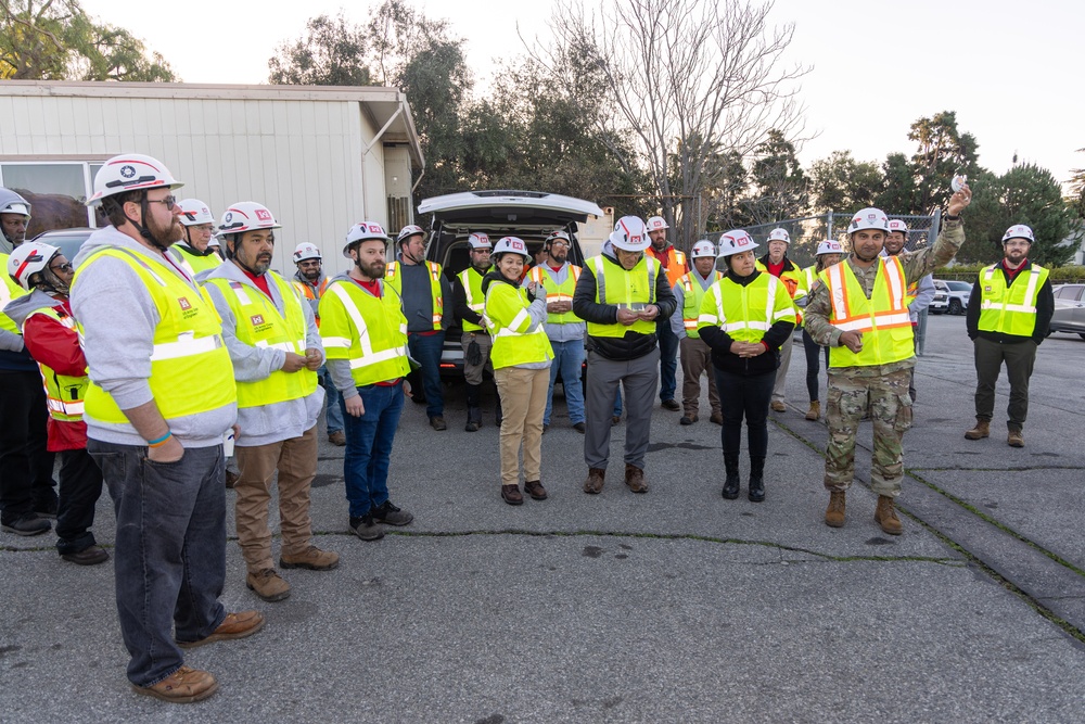 Southern California Wildfires 2025: Southern California Wildfires 2025: Emergency Field Office-Eaton commander talks with Quality Assurance Specialist