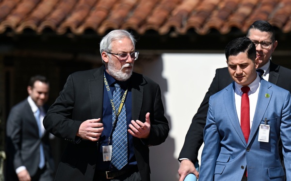 Navy Gage and Standards Laboratory Branch Head Michael Wheeler escorts Assemblyman Bill Essayli of California’s 63rd Assembly District to the Measurement Science and Technology Laboratory during an official visit to Naval Surface Warfare Center, Corona.