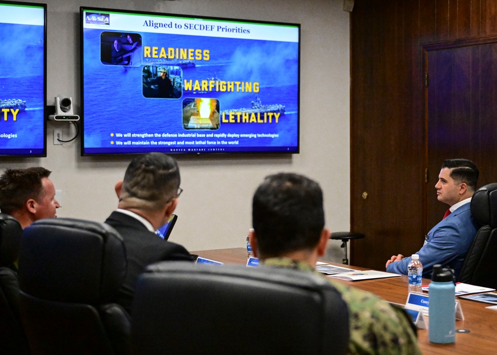 Commanding Officer Capt. Joseph Burgon and Technical Director Elvis Acosta brief Assemblyman Bill Essayli of California’s 63rd Assembly District during an official visit to Naval Surface Warfare Center, Corona Division.