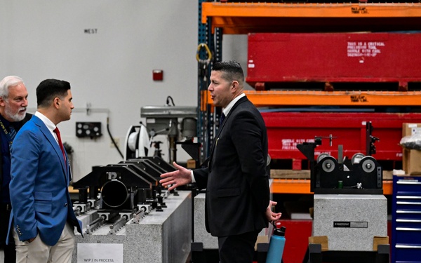 Technical Director Elvis Acosta and Navy Gage and Standards Laboratory Branch Head Michael Wheeler speak to Assemblyman Bill Essayli of California’s 63rd Assembly District during a tour of the Measurement Science and Technology Laboratory at NSWC Corona.