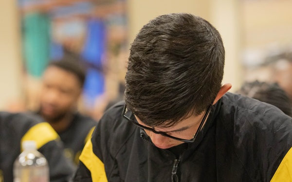 Participants test their knowledge on the first day of class at Operation Holistic Warrior