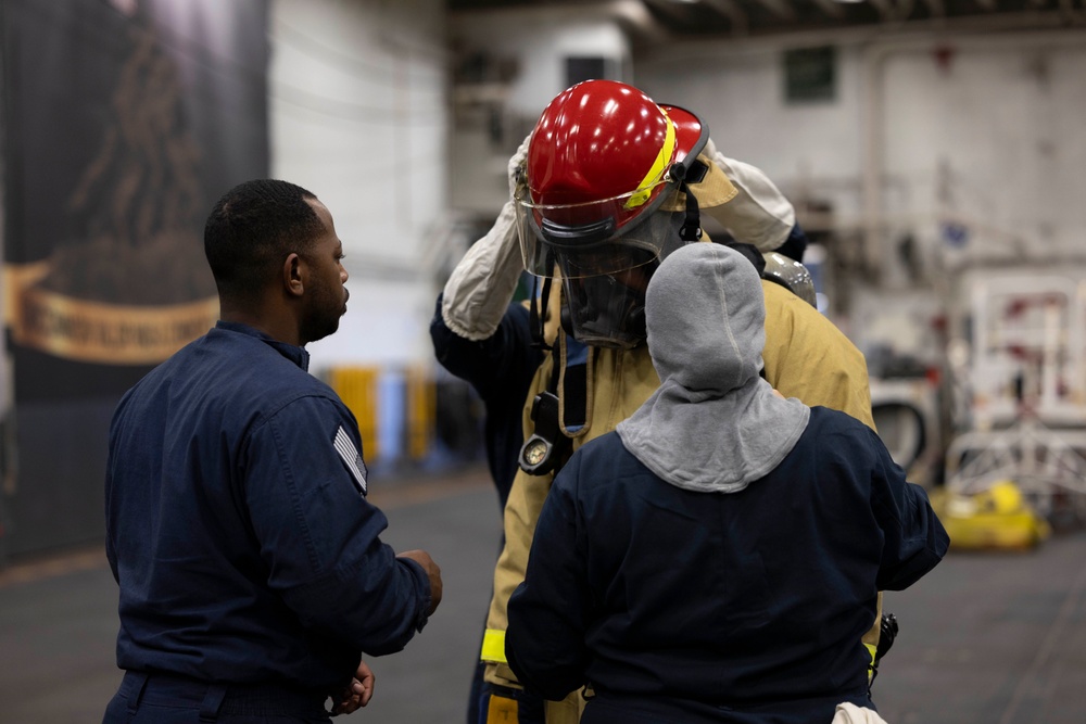 Iwo Jima Sailors take part in damage control efforts during general quarters
