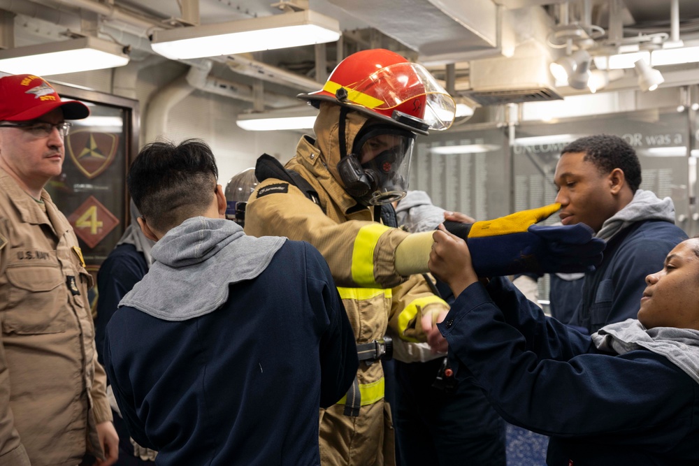 Iwo Jima Sailors take part in damage control efforts during general quarters