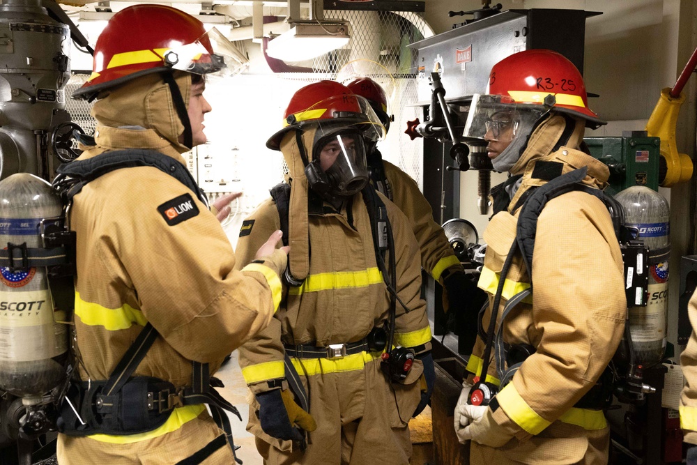 Iwo Jima Sailors take part in damage control efforts during general quarters