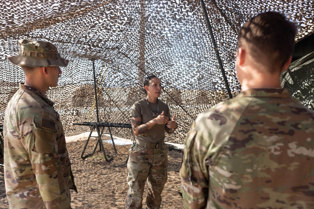 U.S. Service Members conduct simulated medical evacuation training