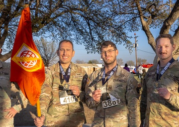 Network Enterprise Technology Command Team Honors Bataan Death March Victims in 26.2-Mile Ruck March