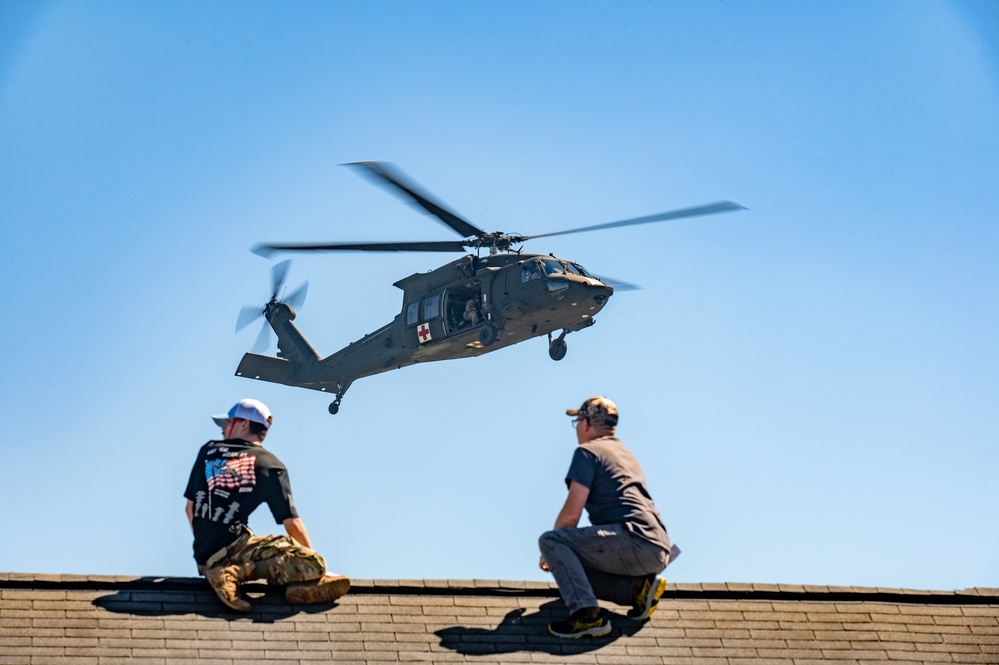 Hoist Operations Simulate Casualty Recovery in Austere Environments