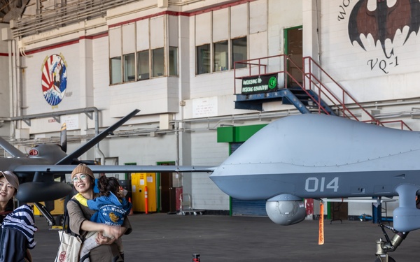 Attendees visit MQ-9 Reapers at Kadena Air Base’s America Fest