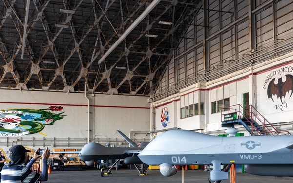 Attendees visit MQ-9 Reapers at Kadena Air Base’s America Fest