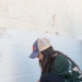 Team Souda paints a local elementary school during a community outreach event