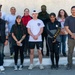 Team Souda paints a local elementary school during a community outreach event