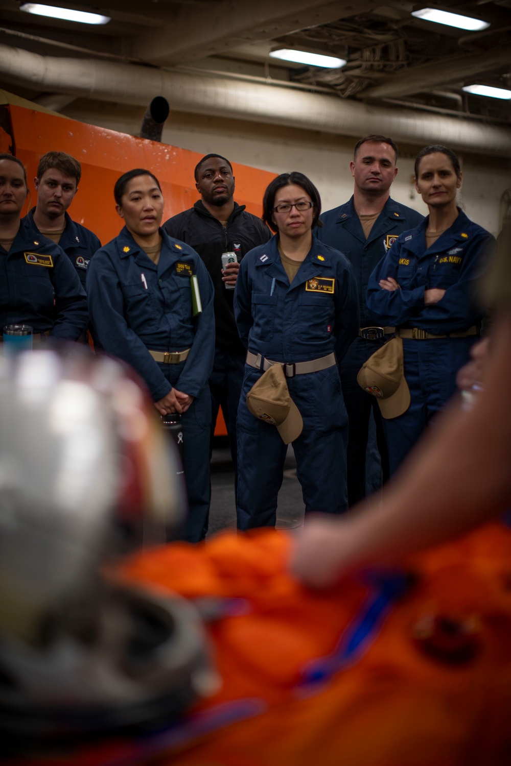 NASA Engineer gives medical training to Sailors for URT-12