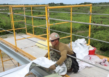 Installing Insulation &amp; Roof Paneling