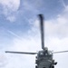 USS Gravely conducts a helicopter in-flight refueling evolution