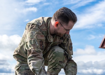 Travis AFB Airmen put new cargo conveyor system to the test