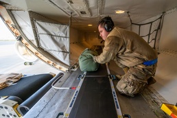 Travis AFB Airmen put new cargo conveyor system to the test