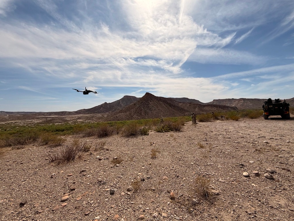 1st Battalion, 12th Infantry Regiment, patrols with a Stryker armored vehicle