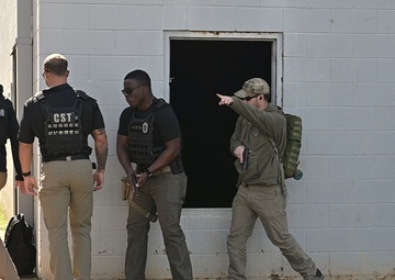 4th Civil Support Team stacks against building