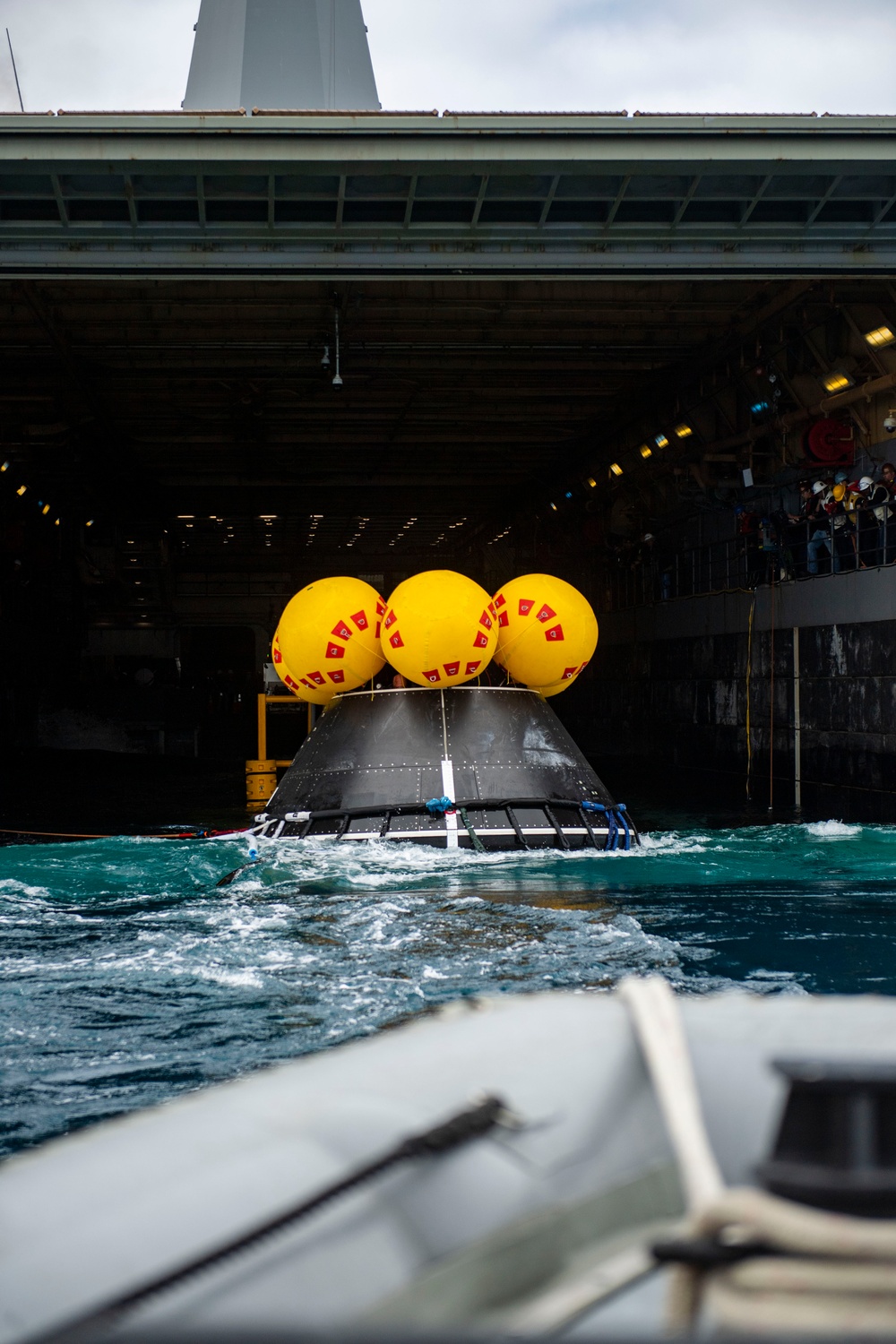 URT-12: USS Somerset conducts small boat operations during recovery tests for NASA