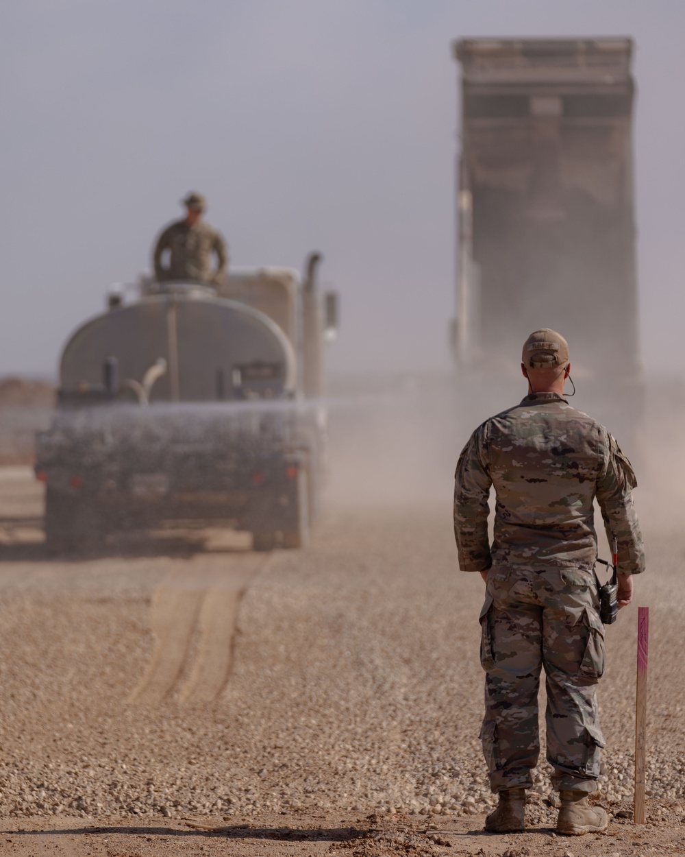 Airmen build and expand a hot cargo pad and marshalling yard in the U.S. CENTCOM AOR