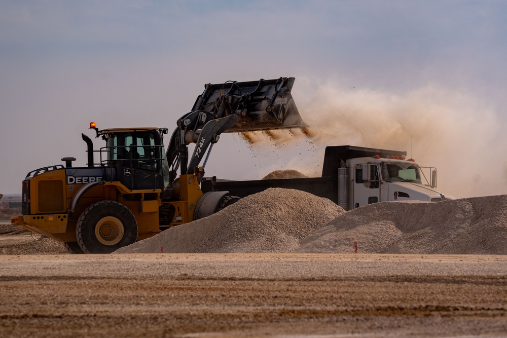 Airmen build and expand a hot cargo pad and marshalling yard in the U.S. CENTCOM AOR