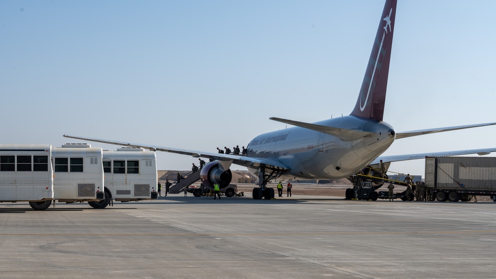 Airmen build and expand a hot cargo pad and marshalling yard in the U.S. CENTCOM AOR
