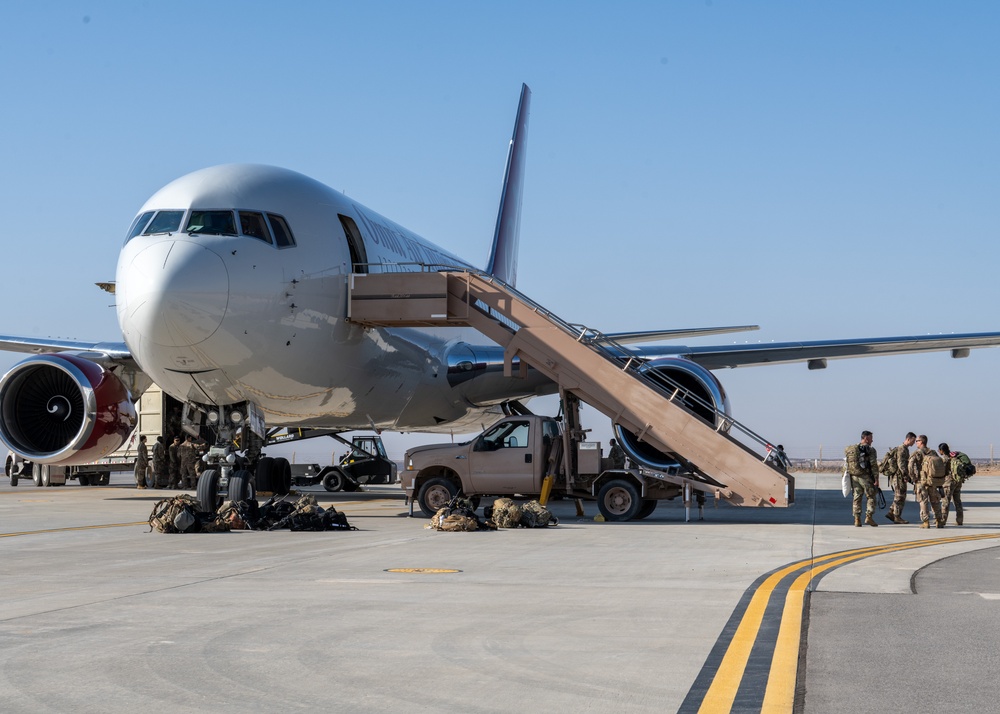 Airmen build and expand a hot cargo pad and marshalling yard in the U.S. CENTCOM AOR