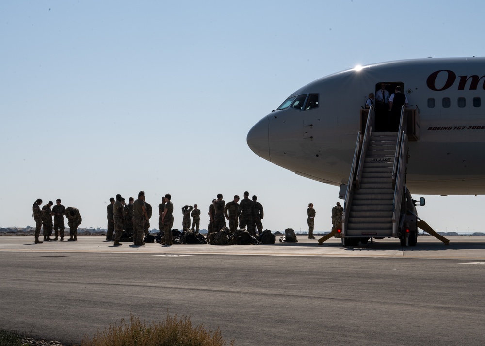 Airmen build and expand a hot cargo pad and marshalling yard in the U.S. CENTCOM AOR