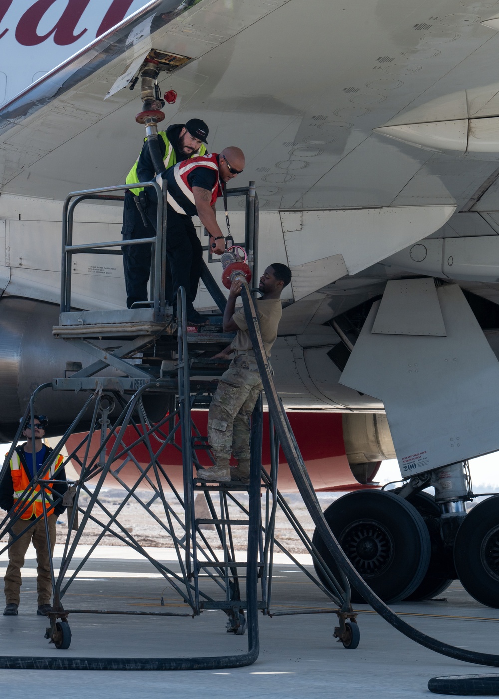 Airmen build and expand a hot cargo pad and marshalling yard in the U.S. CENTCOM AOR