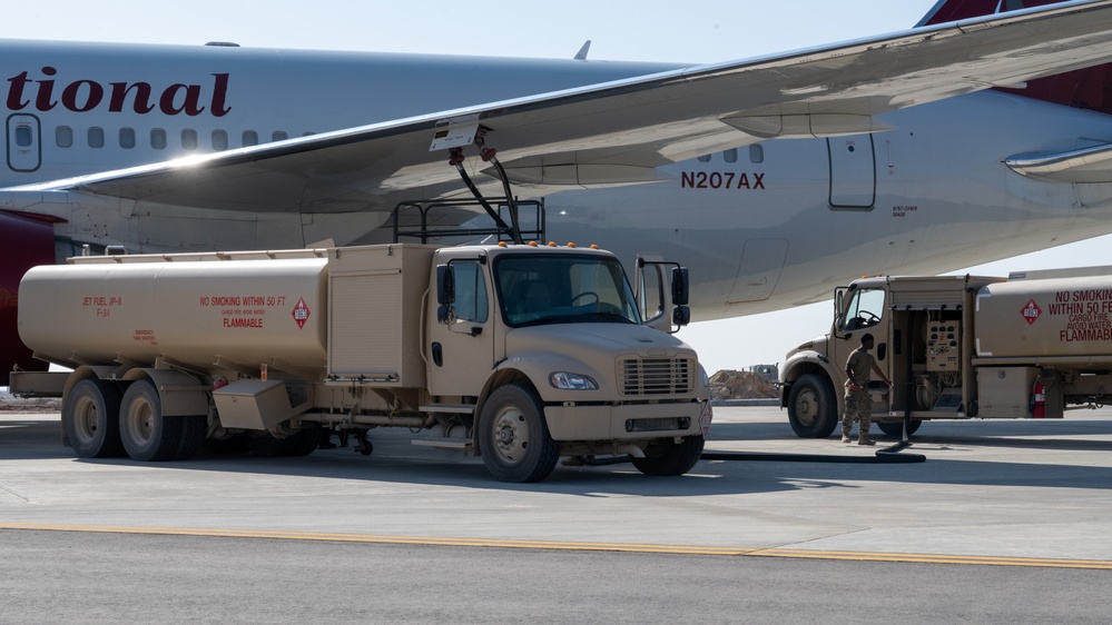 Airmen build and expand a hot cargo pad and marshalling yard in the U.S. CENTCOM AOR