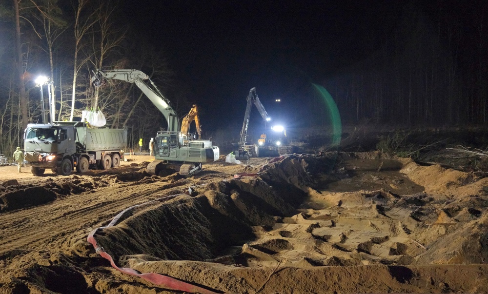 Recovery Efforts Continue at Site of Submerged Vehicle in Search for Missing Soldiers