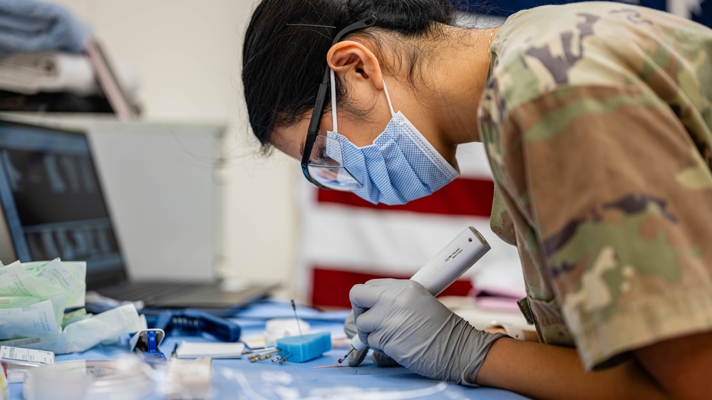 379th EMDS perform root canal procedure on military working dog