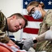 379th EMDS perform root canal procedure on military working dog