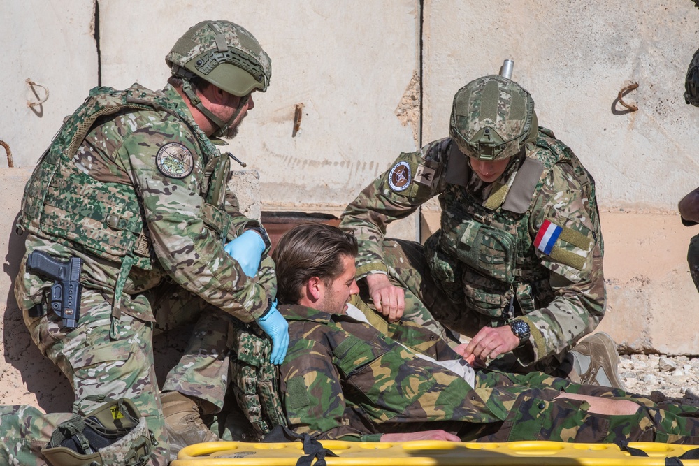 Coalition Forces Conduct Base Defense Exercise at AAAB