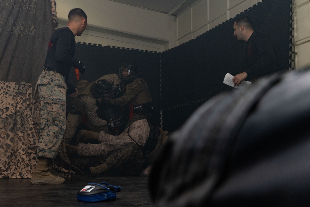 Marines take part in scenario-based training during corporals course