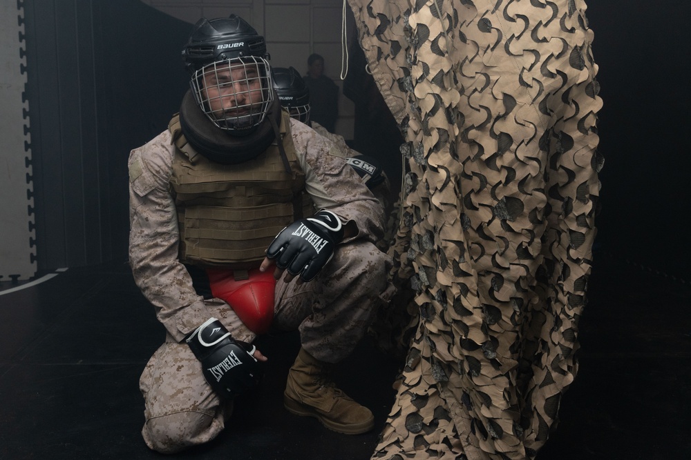 Marines take part in scenario-based training during corporals course