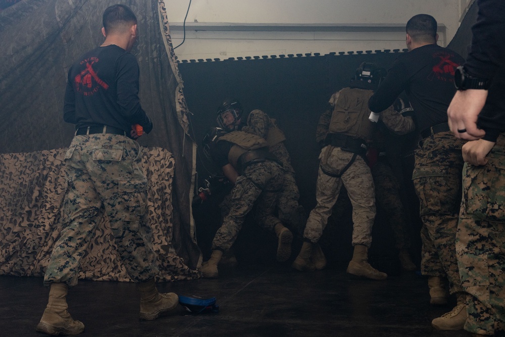 Marines take part in scenario-based training during corporals course