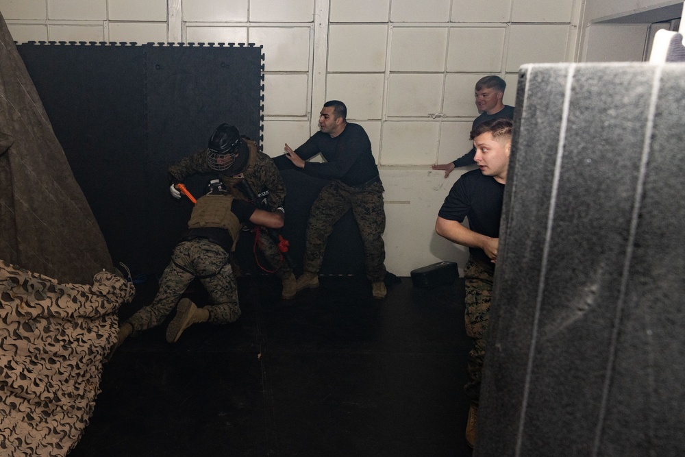 Marines take part in scenario-based training during corporals course