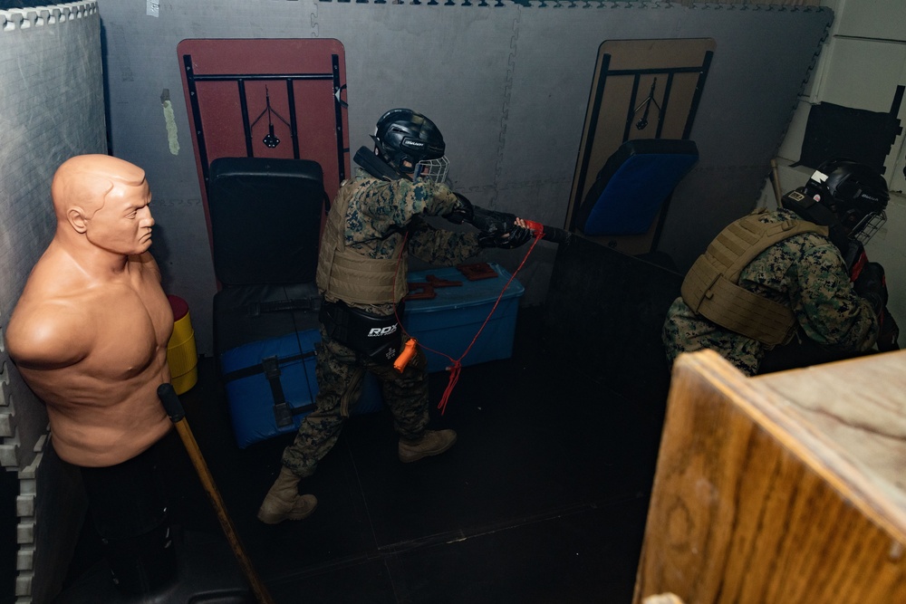 Marines take part in scenario-based training during corporals course