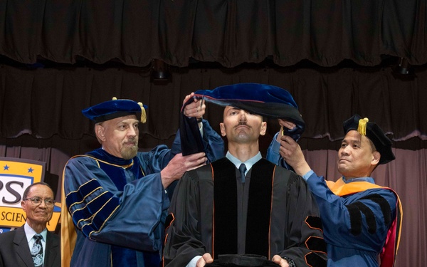 NPS Hall of Fame Alumnus Inspires Graduates During Winter Quarter Commencement