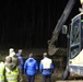 Recovery Efforts Continue Through the Night at Site of Submerged Vehicle in Search for Missing Soldiers