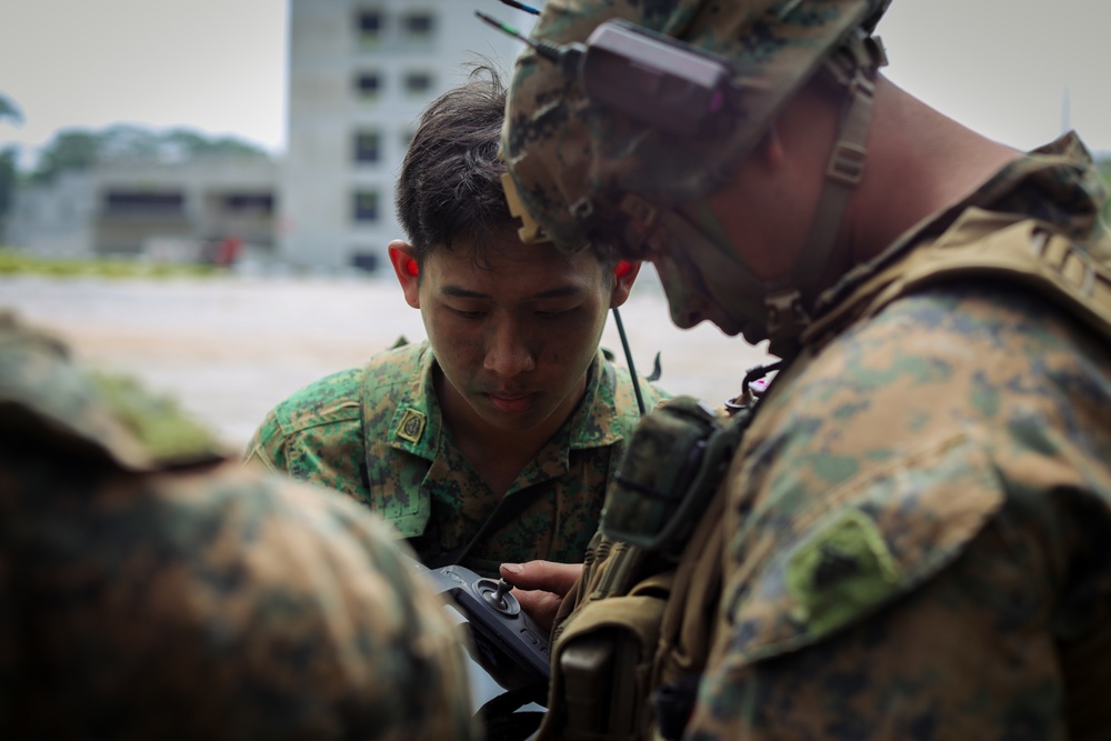 Valiant Mark 25: U.S. Marines and Singapore Guardsmen conduct a UAS operation in preparation for the FTX