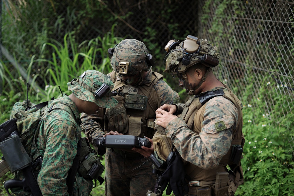 Valiant Mark 25: U.S. Marines and Singapore Guardsmen conduct a UAS operation in preparation for the FTX