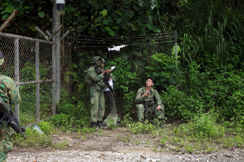 Valiant Mark 25: U.S. Marines and Singapore Guardsmen conduct a UAS operation in preparation for the FTX