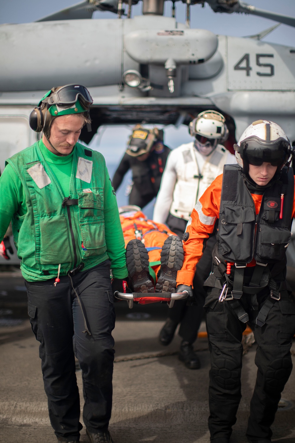 NASA Astronauts and US Navy Sailors participate in URT-12 medical drills