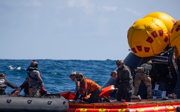 Sailors and NASA Astronauts conduct recovery drills for URT-12